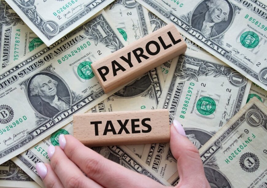 payroll tax block with money in background
