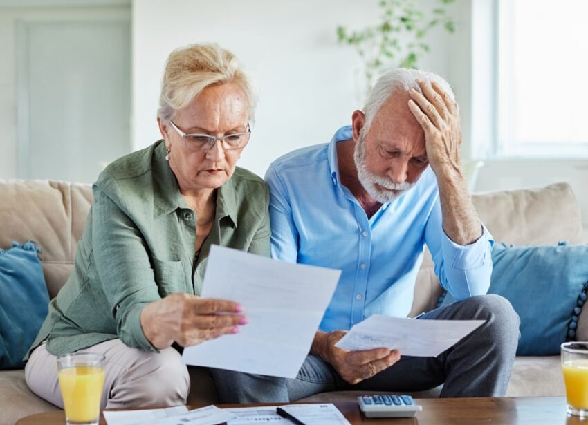 Senior couple checking IRS 401k levy letter